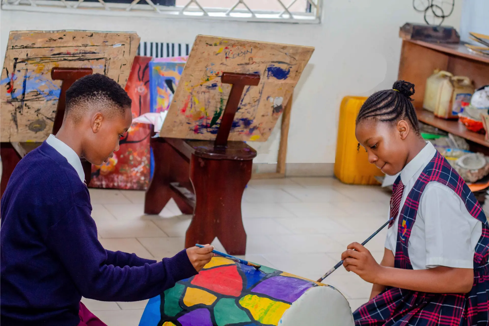 Students painting in the Bloombreed art room