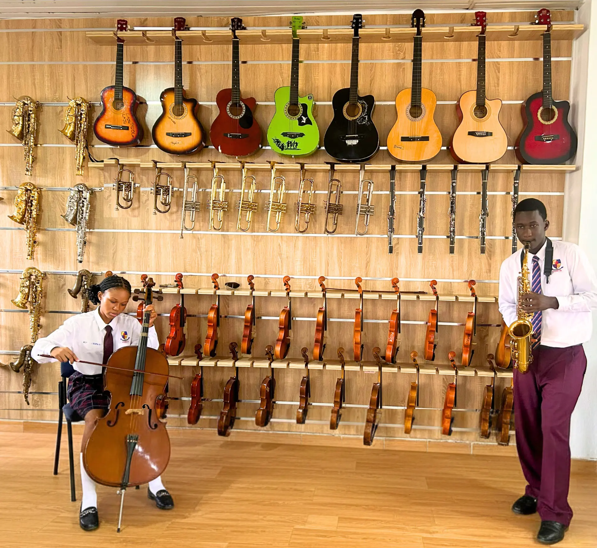 Students playing instruments in the music studio